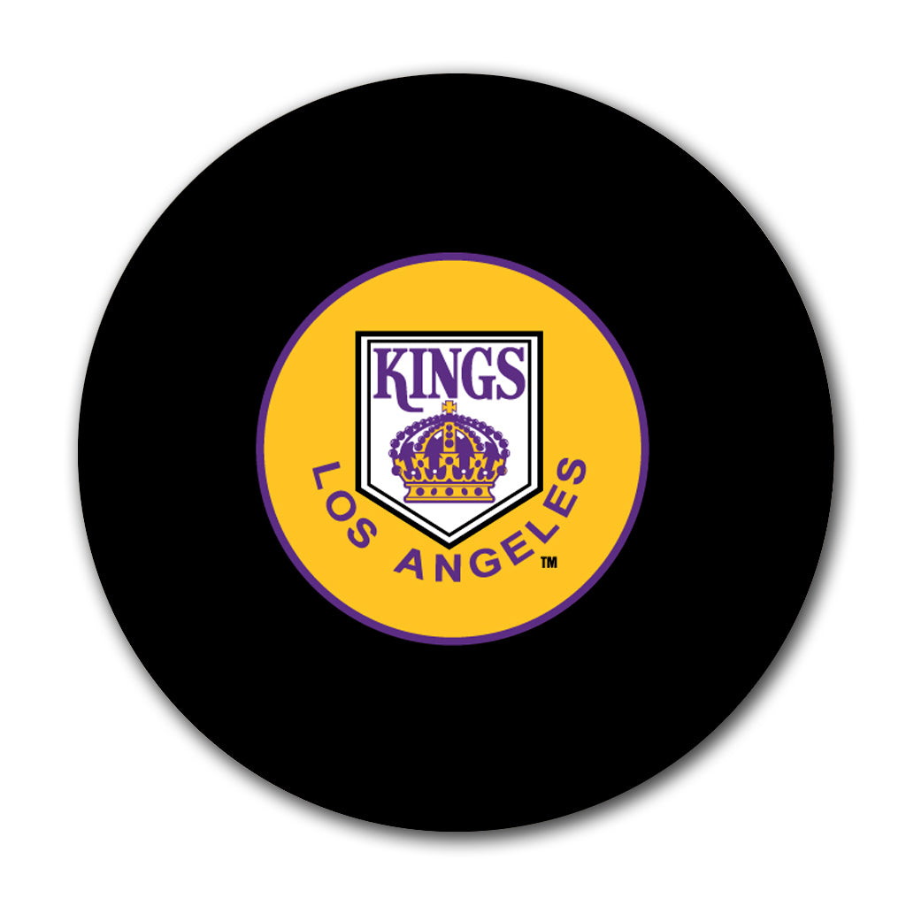 Rogie Vachon précommande une rondelle autographiée des Kings de Los Angeles